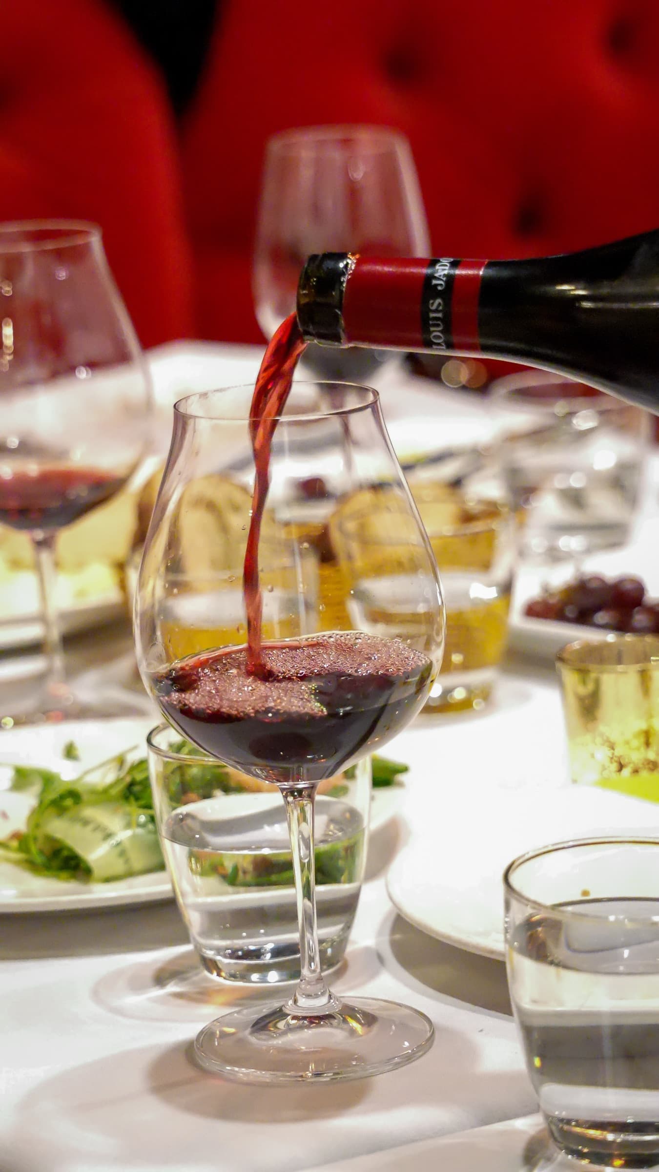 Wine being poured at Parlour